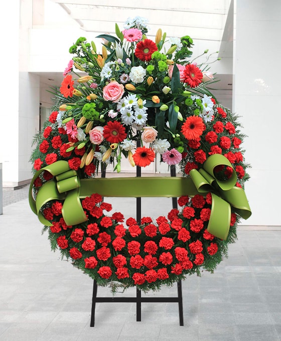 Coronas de flores funerarias Rojas en Mataró